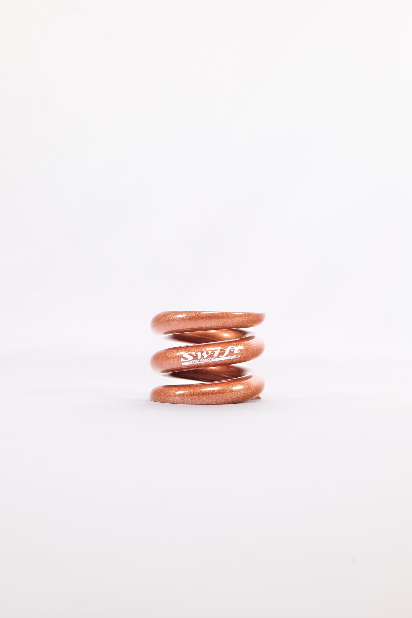 Round Wire Bump Spring - 1.5" Length | 1.99" OD | 6000lbs/inch - Swift Springs USA
