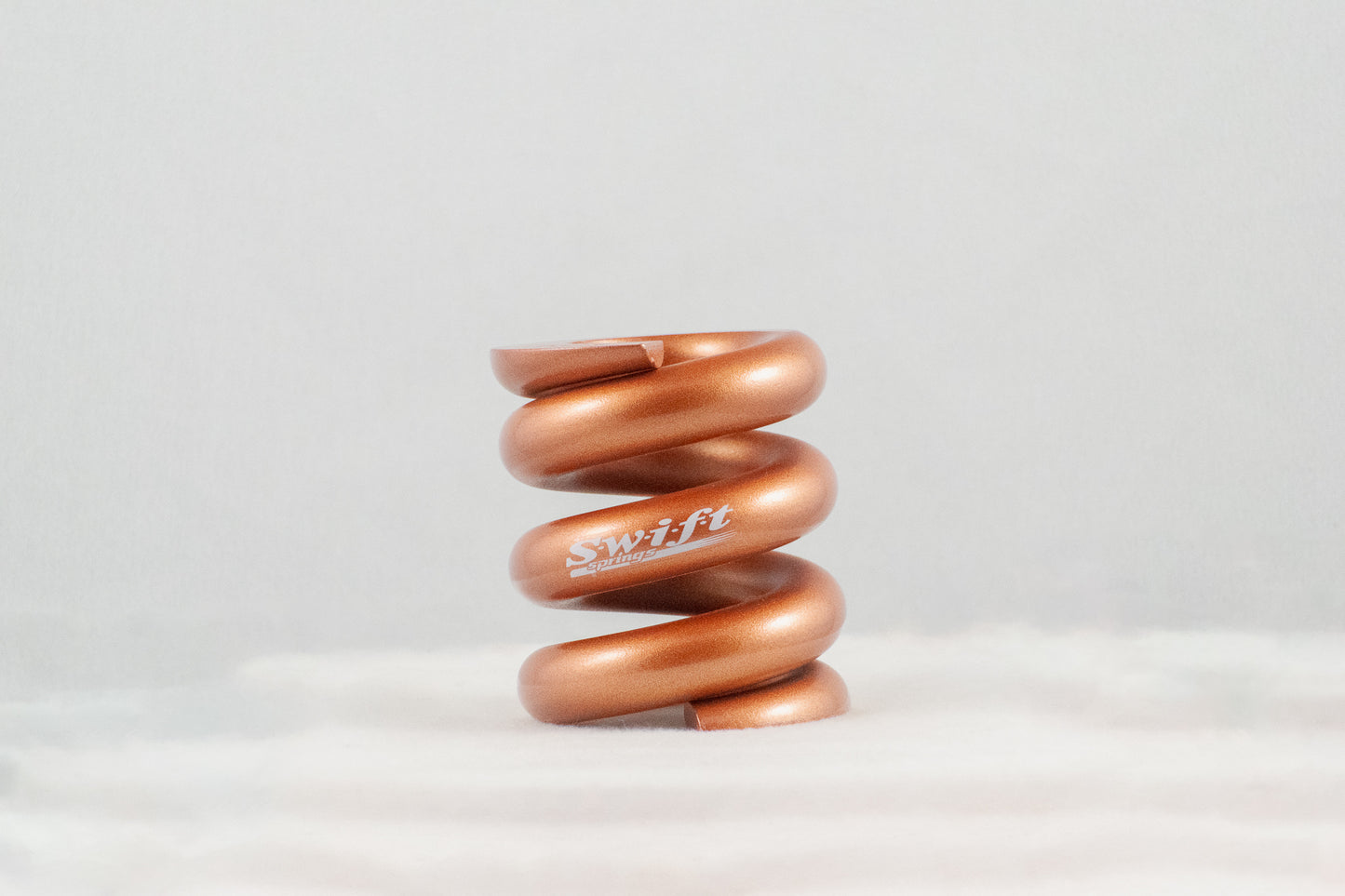 Round Wire Bump Spring - 2.25" Length | 2.0" OD | 8000lbs/inch - Swift Springs USA