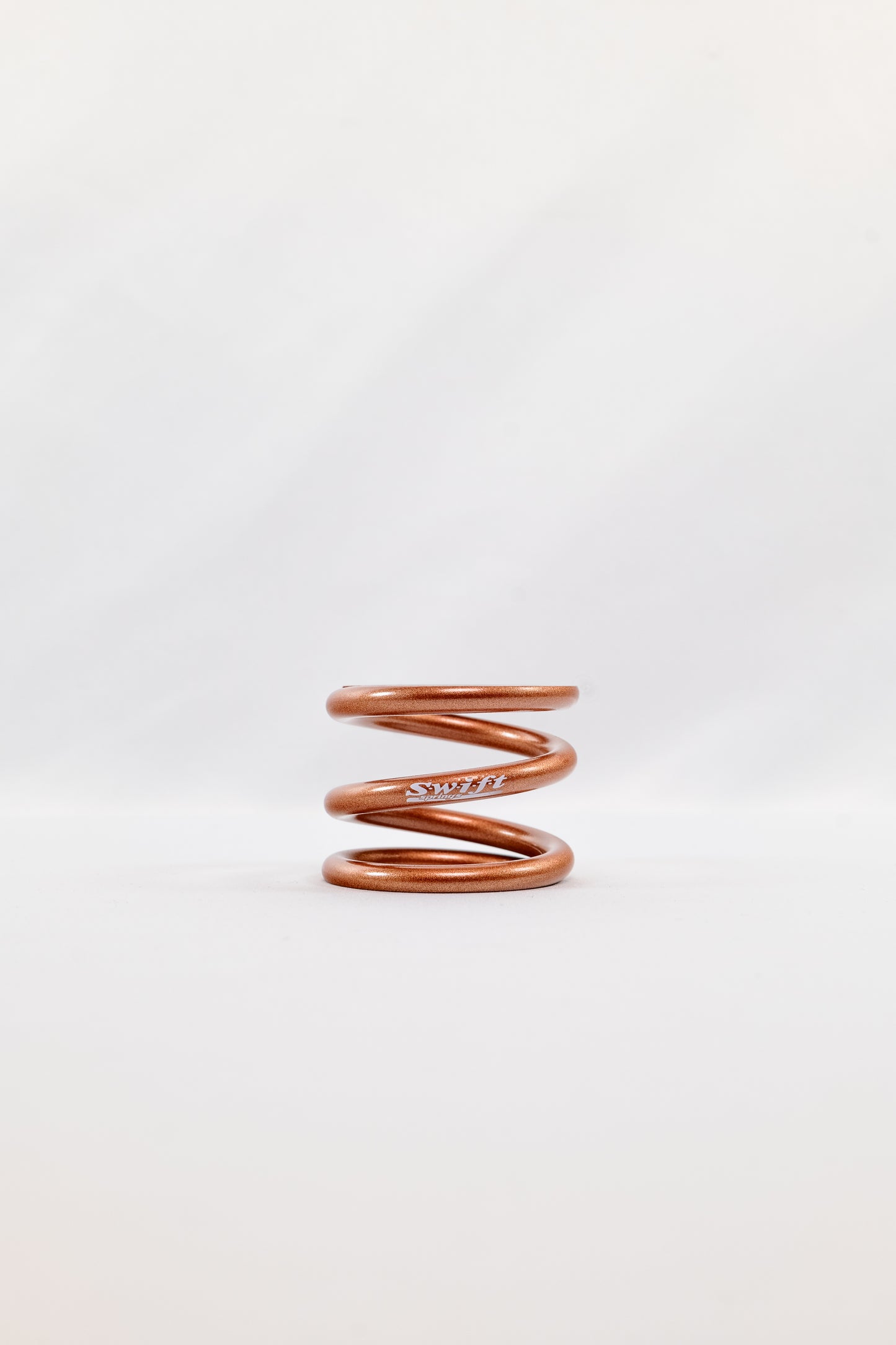Round Wire Bump Spring - 1.5" Length | 1.99" OD | 500lbs/inch - Swift Springs USA