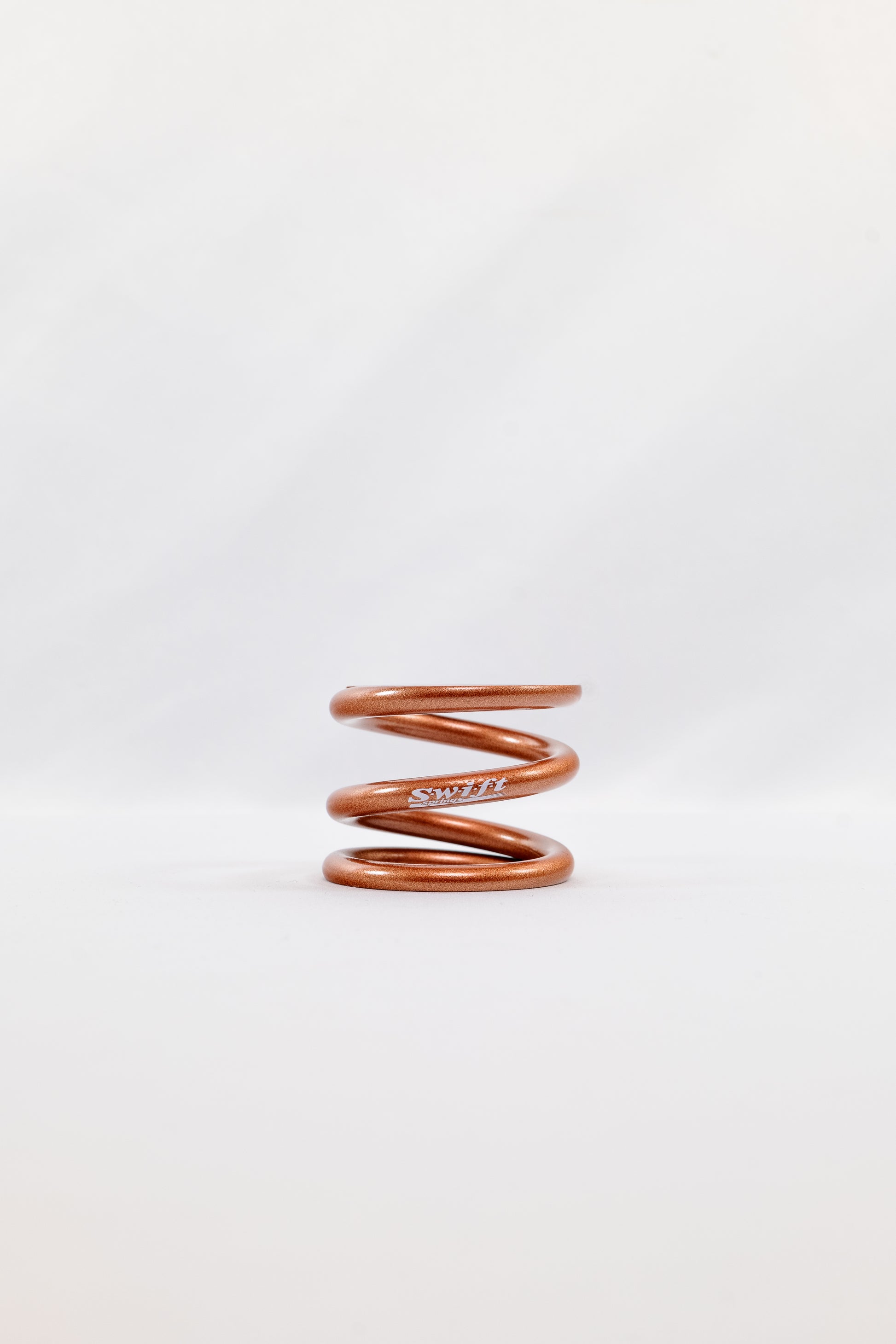 Round Wire Bump Spring - 1.5" Length | 1.99" OD | 600lbs/inch - Swift Springs USA