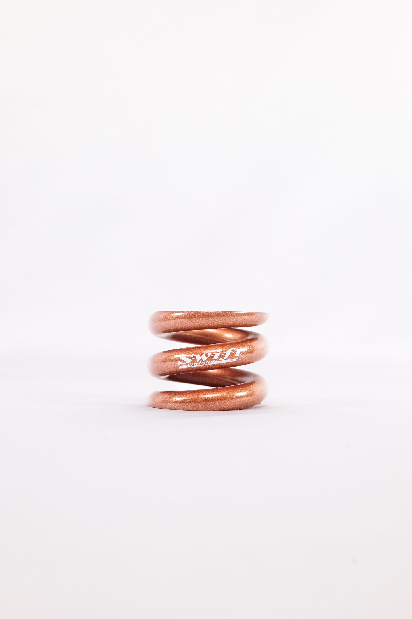 Round Wire Bump Spring - 1.5" Length | 1.99" OD | 5000lbs/inch - Swift Springs USA