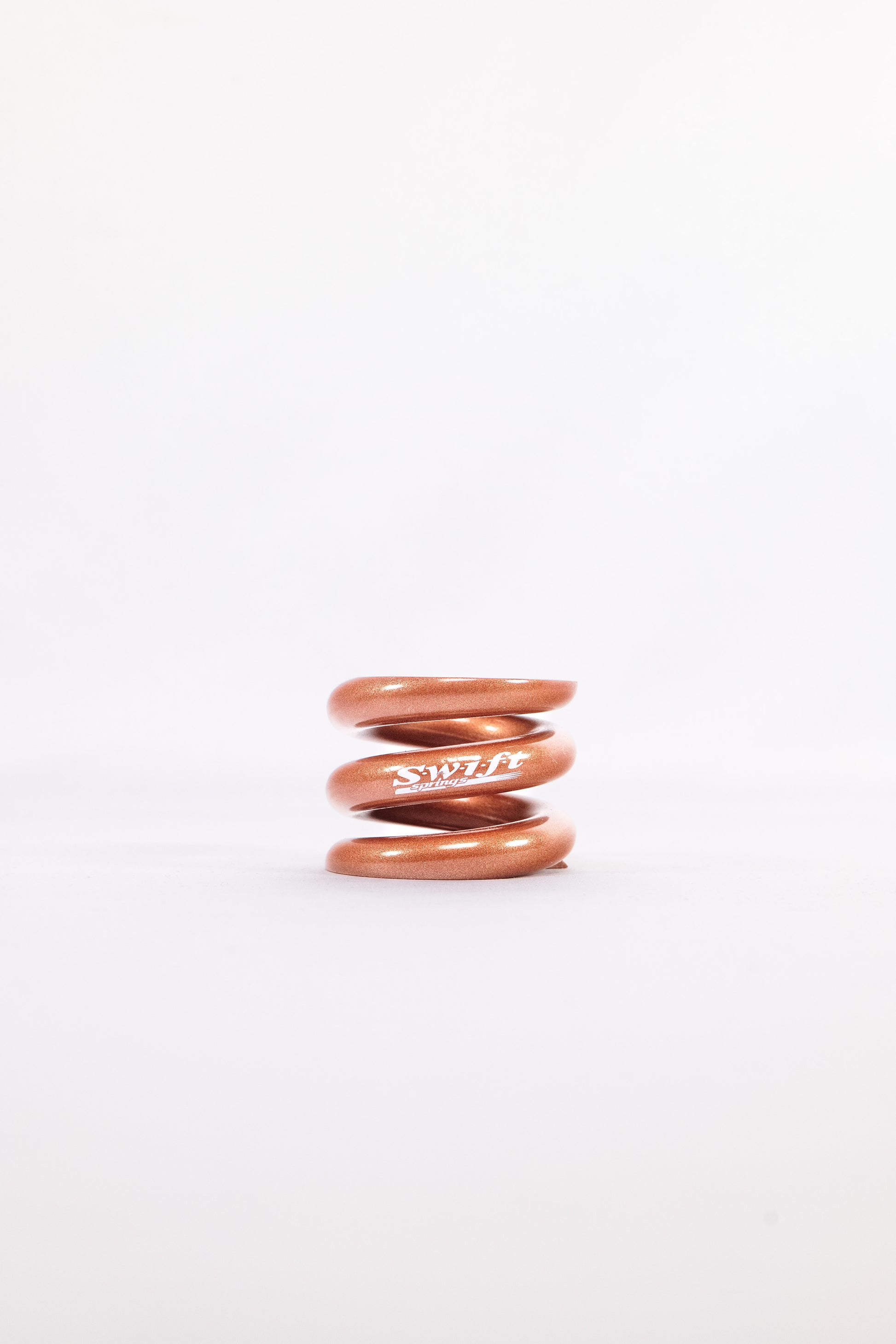 Round Wire Bump Spring - 1.5" Length | 1.99" OD | 6000lbs/inch - Swift Springs USA