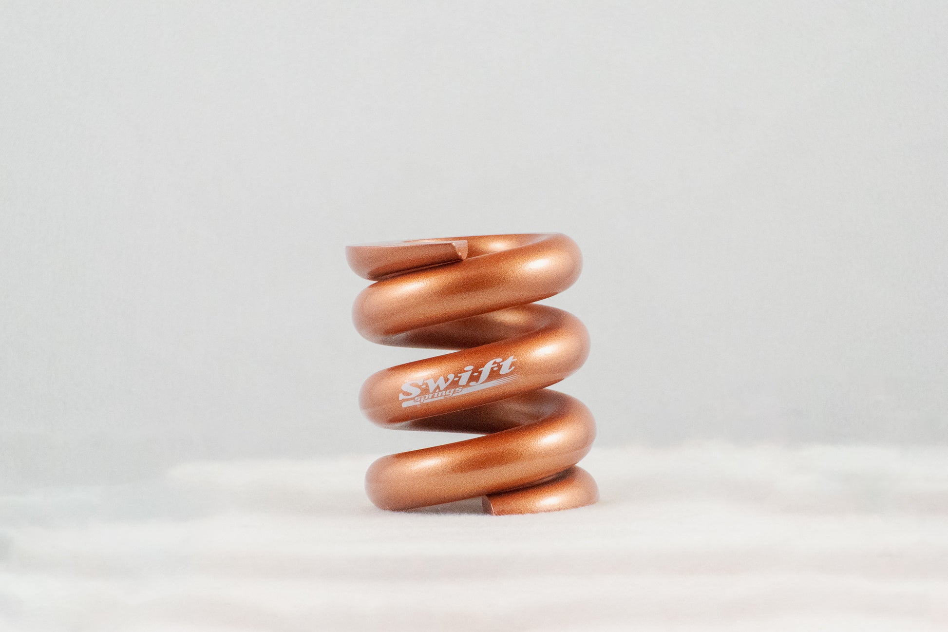 Round Wire Bump Spring - 2.25" Length | 2.0" OD | 8000lbs/inch - Swift Springs USA